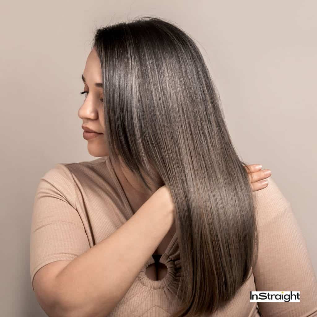 with thick hair with strands of white hair